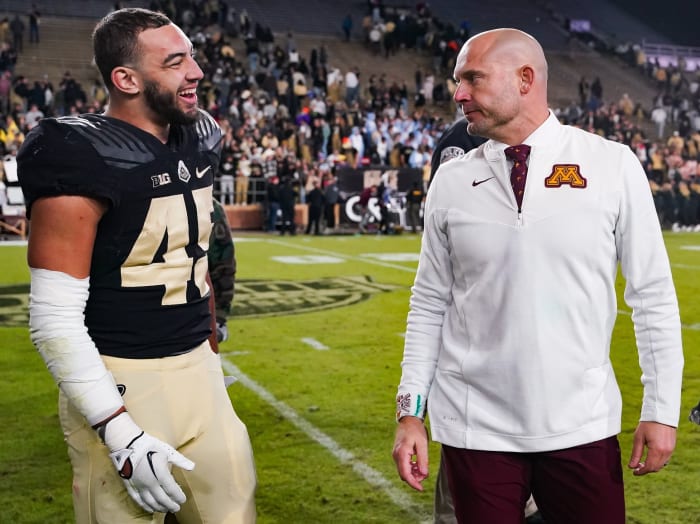 Nov 11, 2023; West Lafayette, Indiana, USA; Purdue Boilermakers running back Devin Mockobee (45) talks with Minnesota Golden Gophers head coach P.J. Fleck after defeating the Minnesota Golden Gophers at Ross-Ade Stadium.